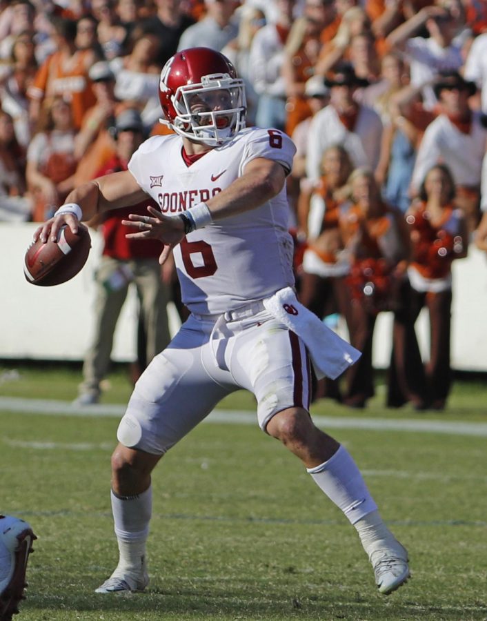 Baker Mayfield steps into a pass against Texas in the Red River Rivalry.