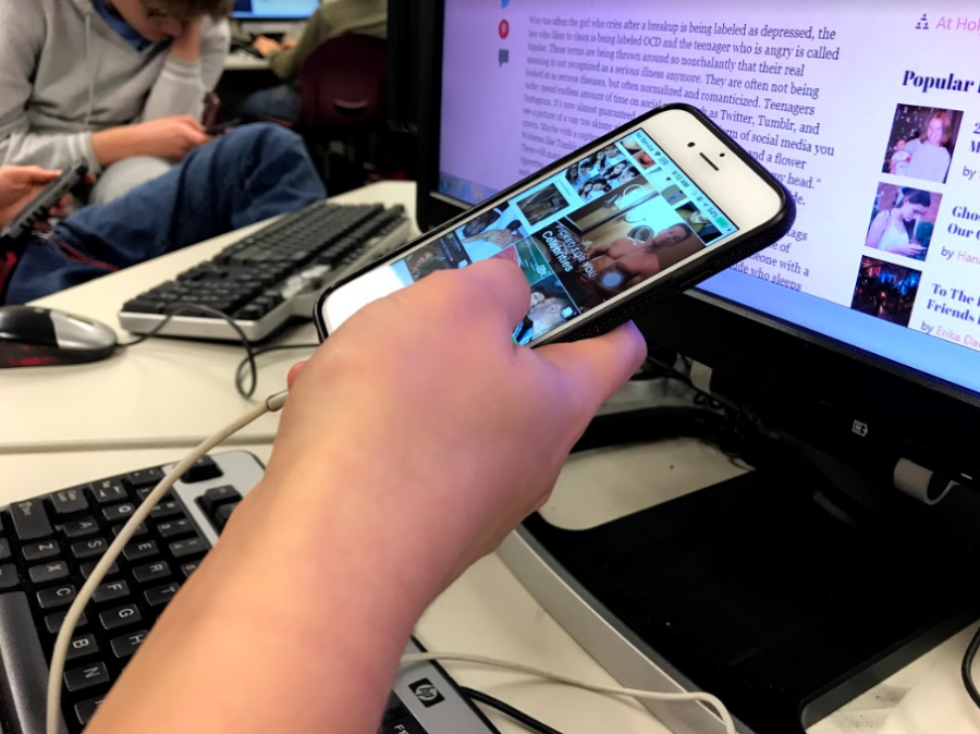 A student scrolls through Instagram. If Net neutrality doesnt pass, they could have to pay to access the app. 