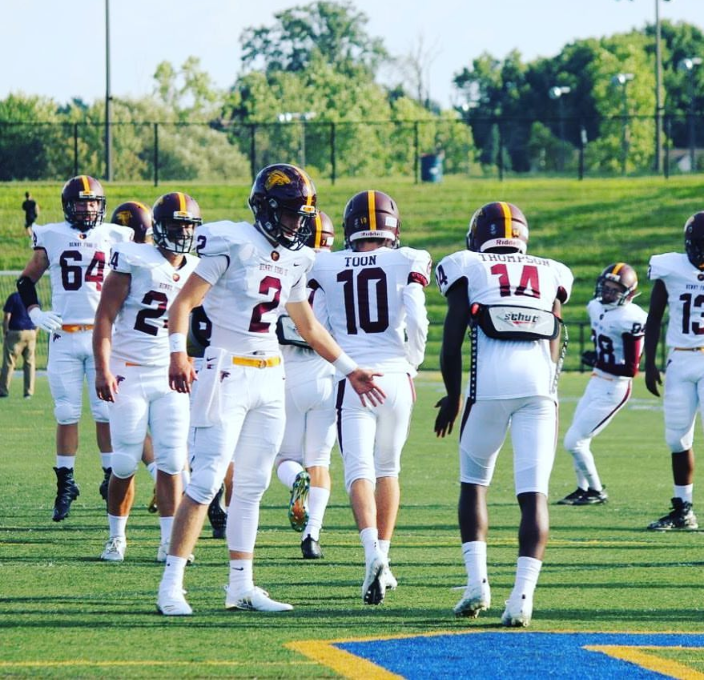 #10 senior Collin Toon, #2 senior Chance Kirkwood, #14 Taveon Thompson are pictured warming up before their Stoney Creek game.
